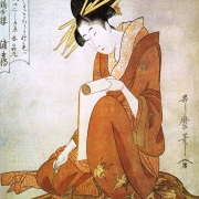 Žena píšící na svitku